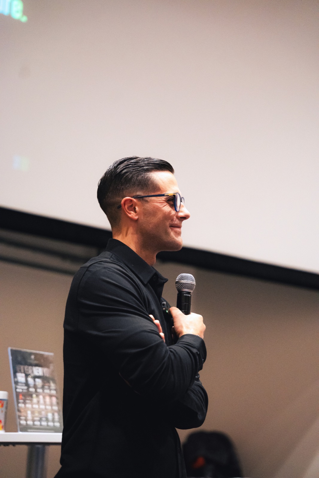 Kelowna entrepreneurs and small business founders networking at a Kelowna Founders Club event, comparing the AI tools they use to grow their businesses